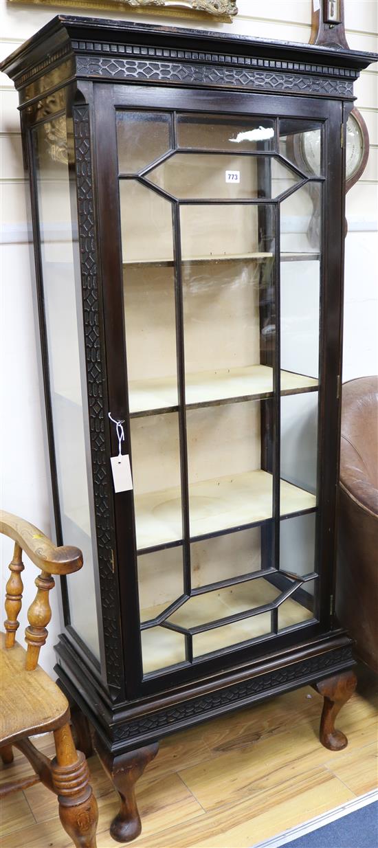 A George V ebonised display cabinet, H.166cm